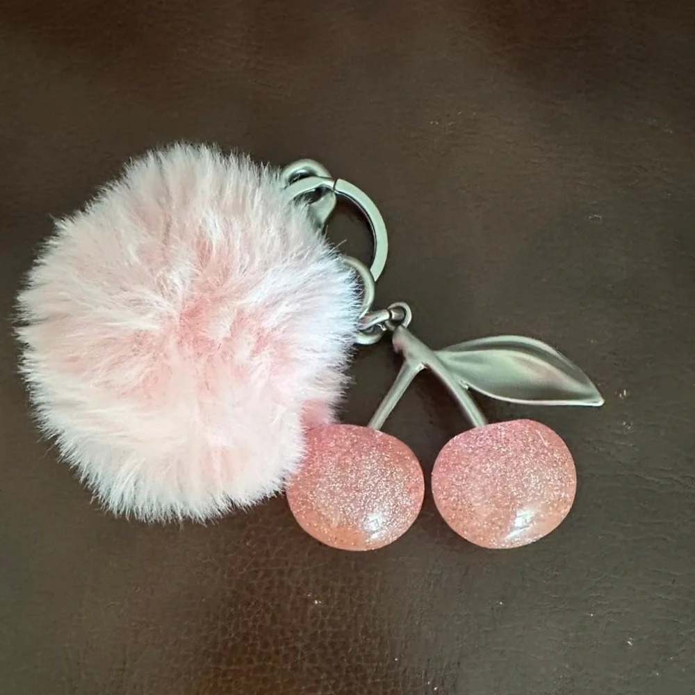 Pink sparkle cherries with pink poof ball purse charm bag charm